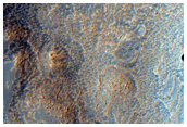Channels and Depression in Northern Arabia Terra
