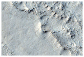 Cliffs and Stratified Features in Central Arabia Terra
