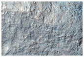Graben and Rocky Deposits on Crater Floor in Margaritifer Terra
