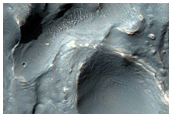 Crater in Claritas Fossae Region
