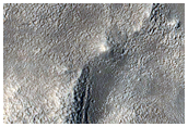 Two Exit Breaches in Young Crater
