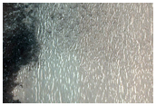 Dark-Toned Materials in North Polar Region
