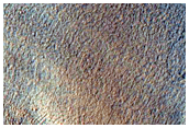 Pits and Cracks Near Moreux Crater
