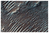 Features in and Around Crater in Tyrrhena Terra
