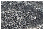 Channel Near Ejecta in Northern Mid-Latitudes
