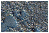 Possible Beaded Stream on Floor of Lyot Crater
