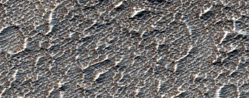 Древнее поле лавы к западу от горы Arsia Mons