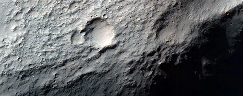 Channel Eroded Crater in Samara Valles Region
