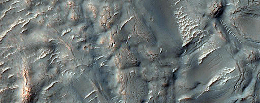 Flow-Like Mound in Equatorial Crater
