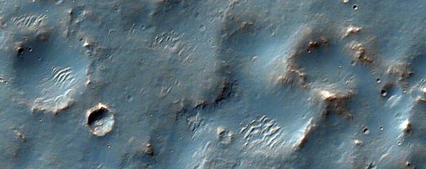 Lobate Form Adjacent to Crater Wall
