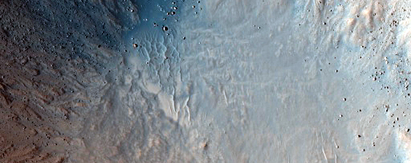 Small Well-Preserved and Potentially Gullied Crater in Idaeus Fossae
