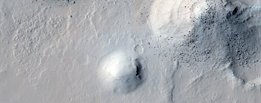 Stair-Stepped Landforms in East Pasteur Crater
