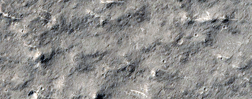 Intracrater Sinuous Ridge and Butte Forming Material
