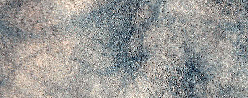 Crater Floor Deposits Near Lyot Crater
