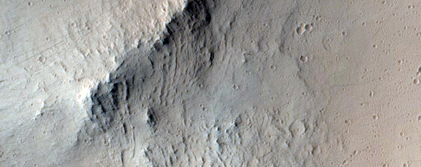 Crater with Central Peak and Ejecta
