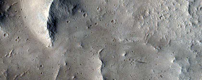 Crater with Central Peak Northeast of Olympus Mons
