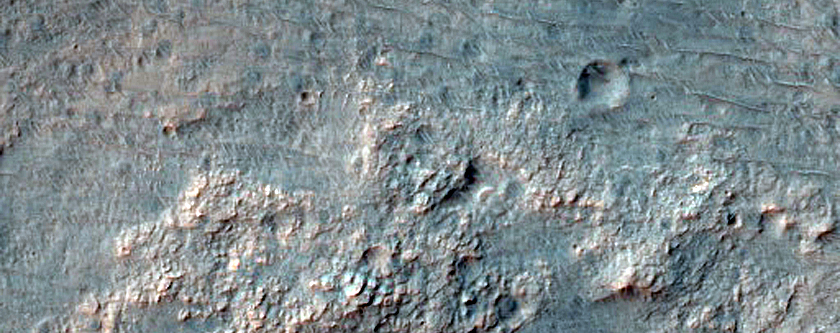 Impact Ejecta on Floor of Savich Crater
