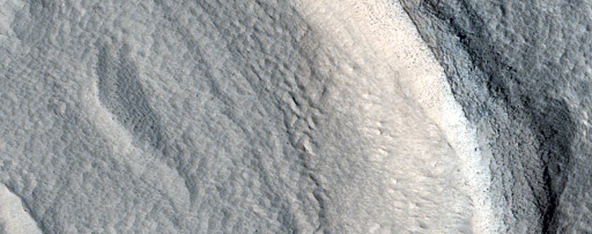 Layered Deposit in Crater in Galaxias Fossae