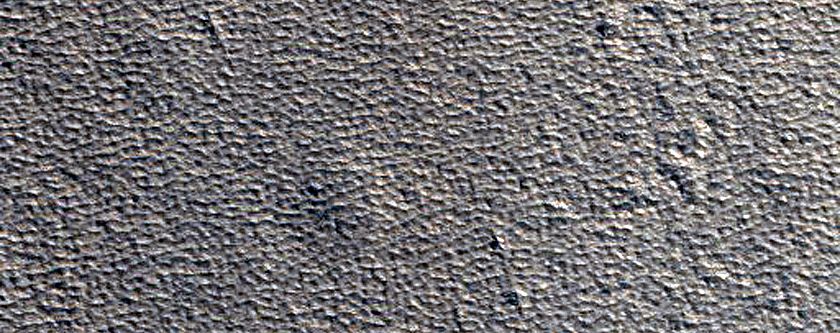 Scarp in Mantle Material in Milankovic Crater
