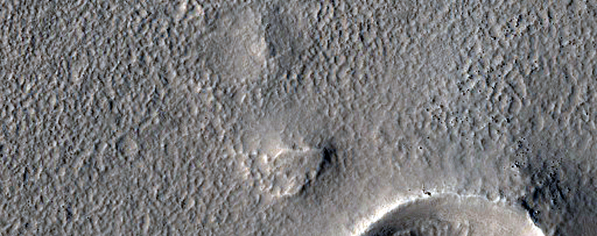 Layered Features in Craters in Nilosyrtis Mensae

