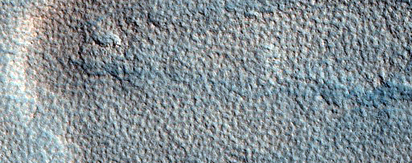 Small Conical Features on Northern Plains

