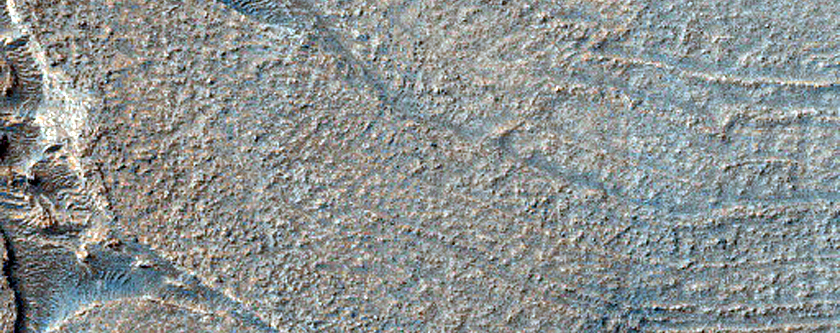 Crater and Band in Hellas Planitia
