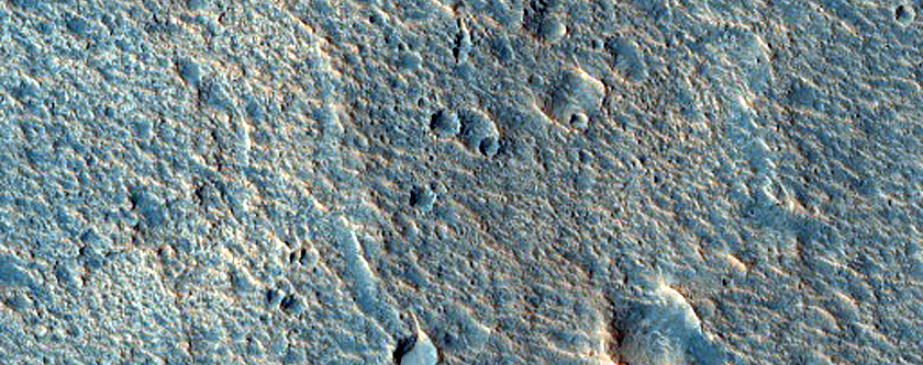 Small Craters in Tail of Streamlined Island
