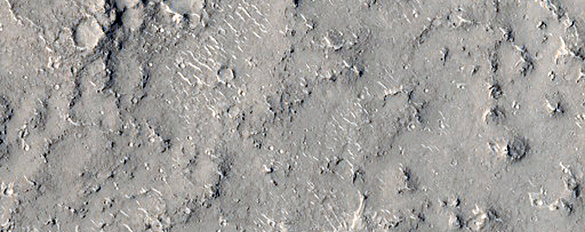Line of Pits in Tartarus Colles Region

