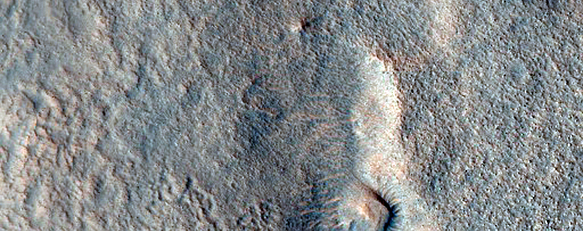 Dipping Layers in Depressions in Deuteronilus Mensae
