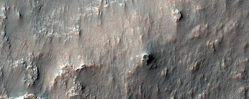 Mound with Gullies and Channels in Northern Hellas Planitia
