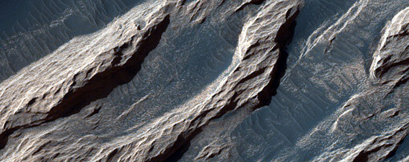 Formation Dubbed White Rock on Floor of Pollack Crater 
