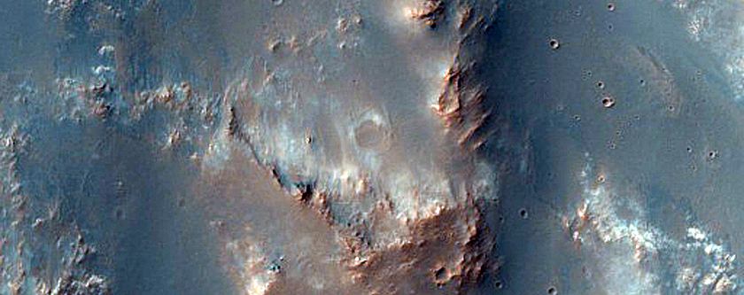 Olivine and Low Calcium Pyroxene-Rich Mound Wall in Tyrrhena Terra
