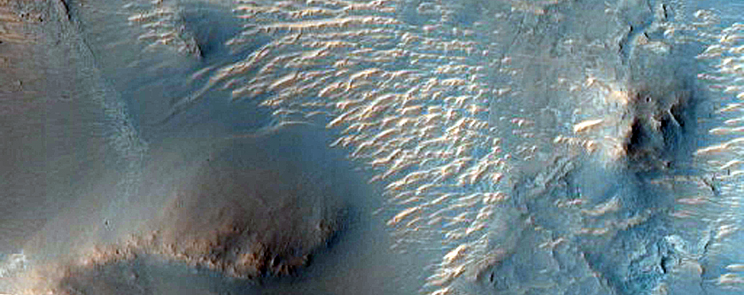 Layered Deposits Inside in Crater in Western Arabia Terra
