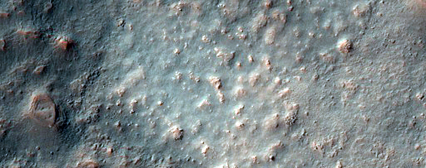 Tader Valles Emptying into Possible Delta
