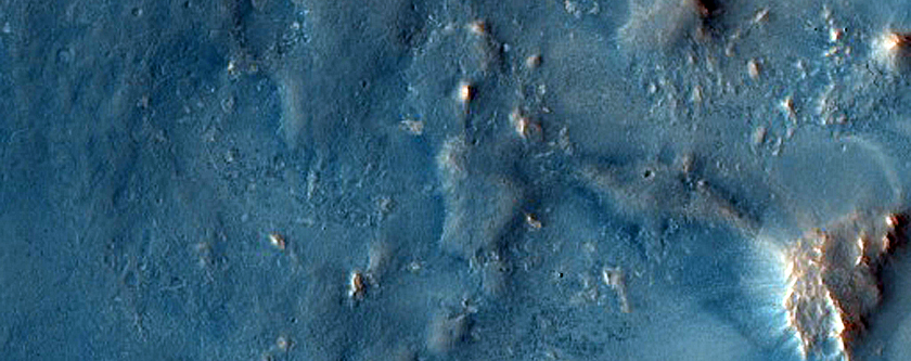 Flow and Southeast Antoniadi Crater Rim