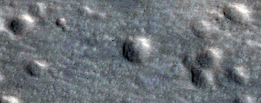 Ejecta and Expanded Secondaries from Domoni Crater
