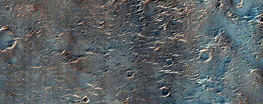 Crater Exposing Layered Ejecta in Tyrrhena Terra
