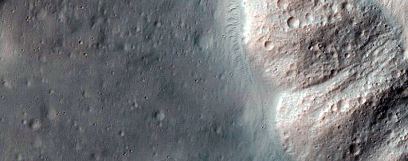 Well-Preserved Impact Crater with Gullies
