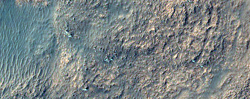 Crater Floor Pit with Hints of Layering
