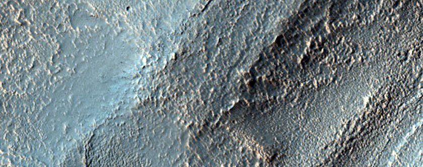 Possible Layer Tilts in Well-Exposed Layered Crater Floor Materials