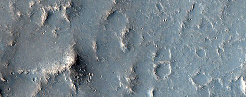Topographic Transition from Chaotic Terrain to Outflow Channel Terrain
