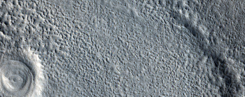 Layered Feature in Crater near Hrad Vallis

