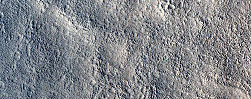 Crater with Tall Mesa in Northern Mid-Latitudes
