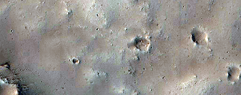 Fan-Shaped Form at Valley Terminus in Crater