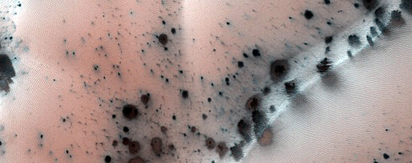 Intracrater Dune Field and Associated Extracrater Dark Streak
