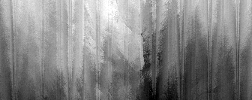 Monitor Low Albedo Slopes along Coprates Chasma Ridge
