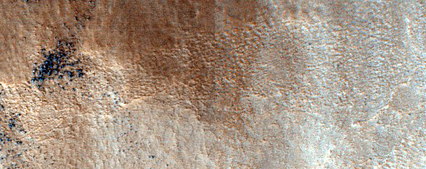 Mantle Layers on Southern Rim of Mie Crater

