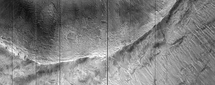 Crater with Layered Ejecta and Possible Faulting
