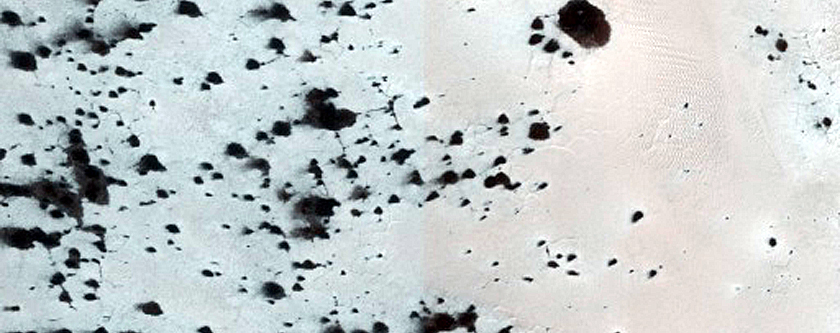Cryptic Terrain Margin Monitoring in Reynolds Crater
