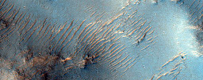 Valley on Crater Wall Near Tinto Vallis
